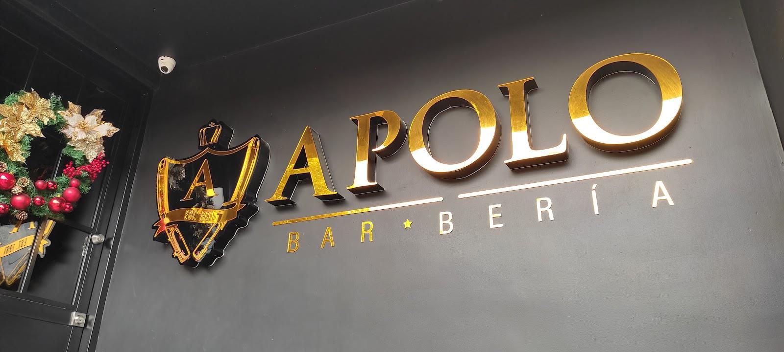 Letrero dorado APOLO BARBERÍA con su escudo